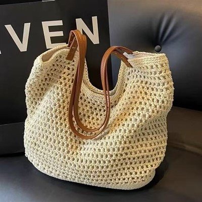 Designer ullstrikket veske