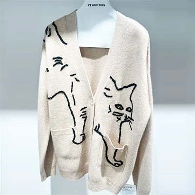 Designerkåpe i ull for damer